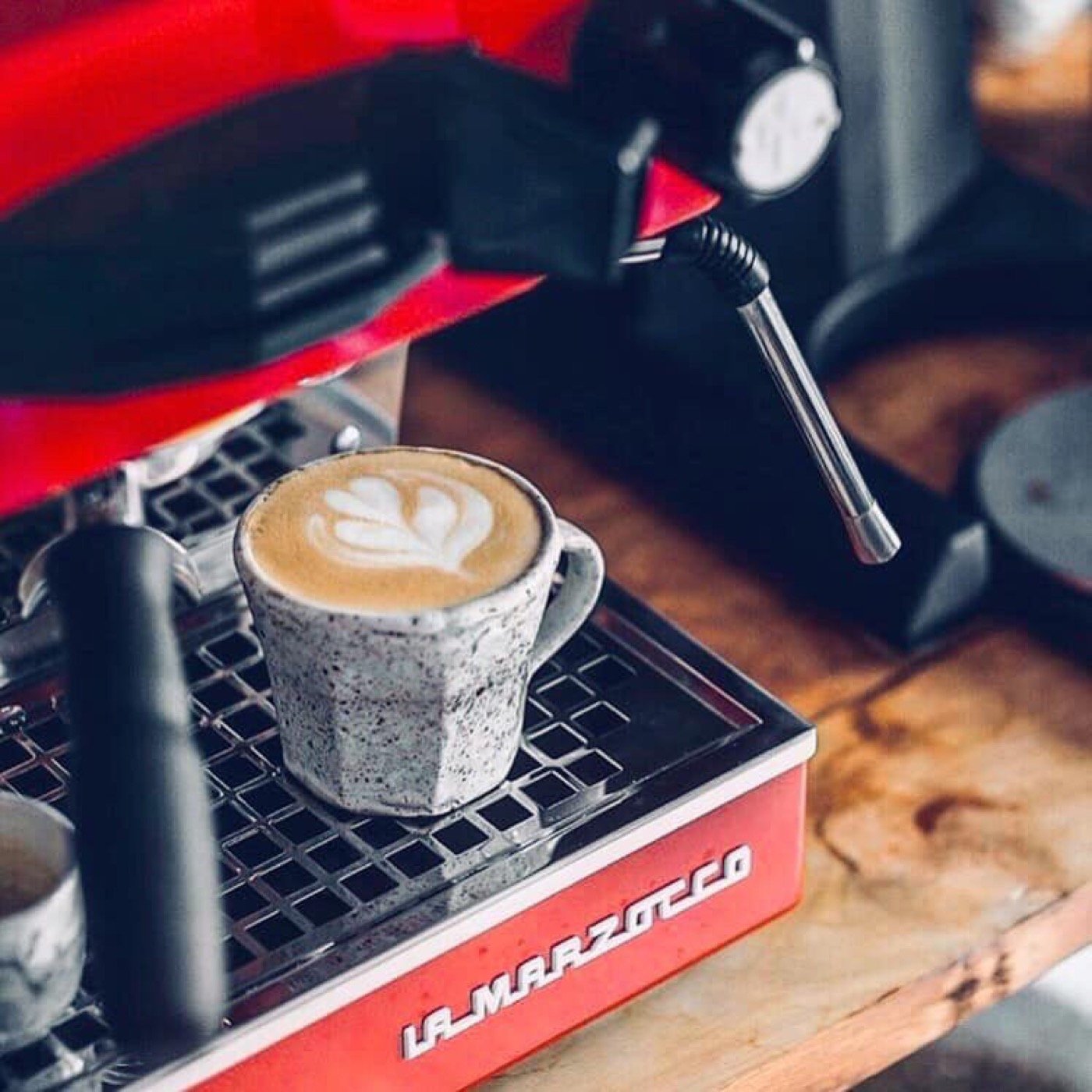 Latte art on a La Marzocco machine